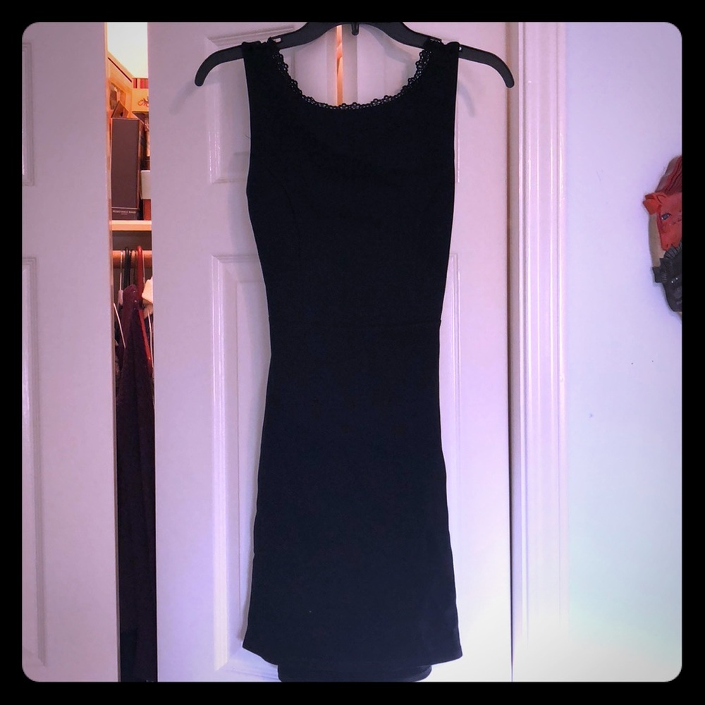 Tight fitting black lace dress